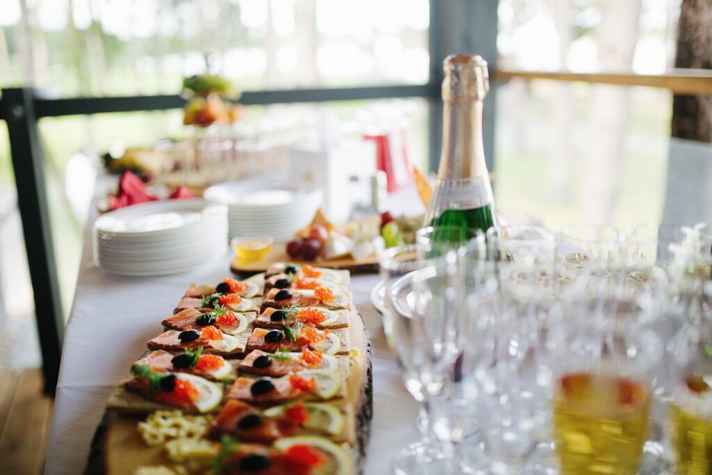 Champagne bottle with elegant hors d'oeuvres