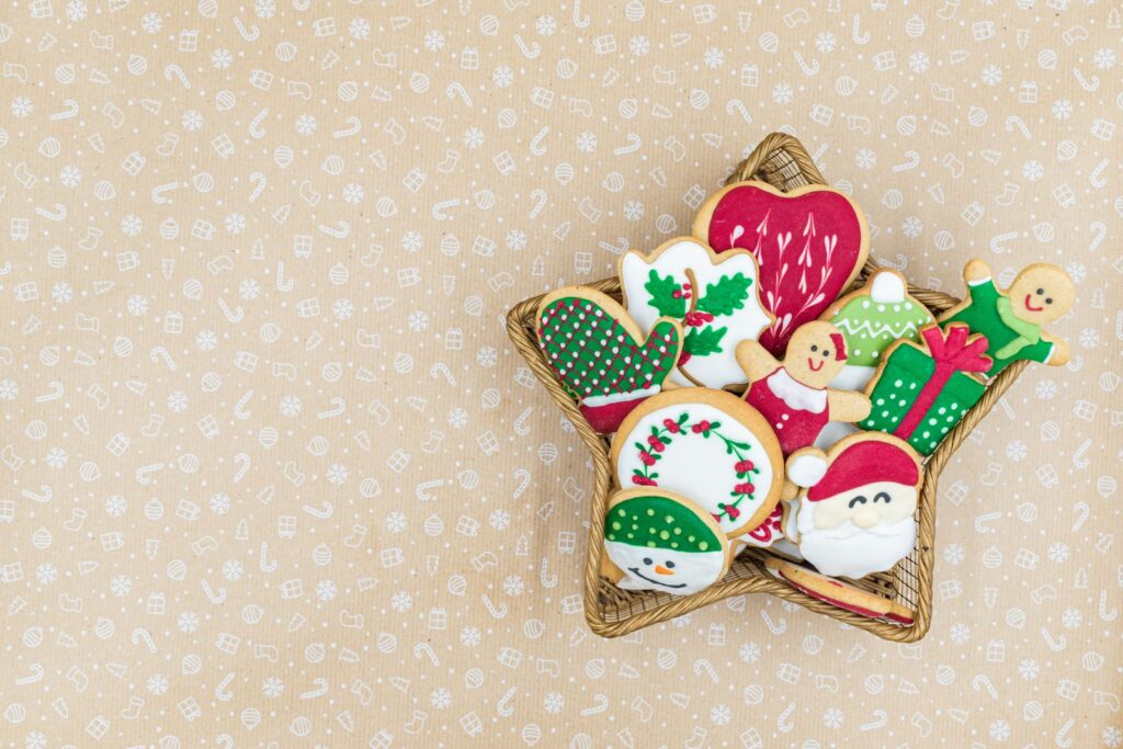 Colorful frosted Christmas cookies on a star shaped plate