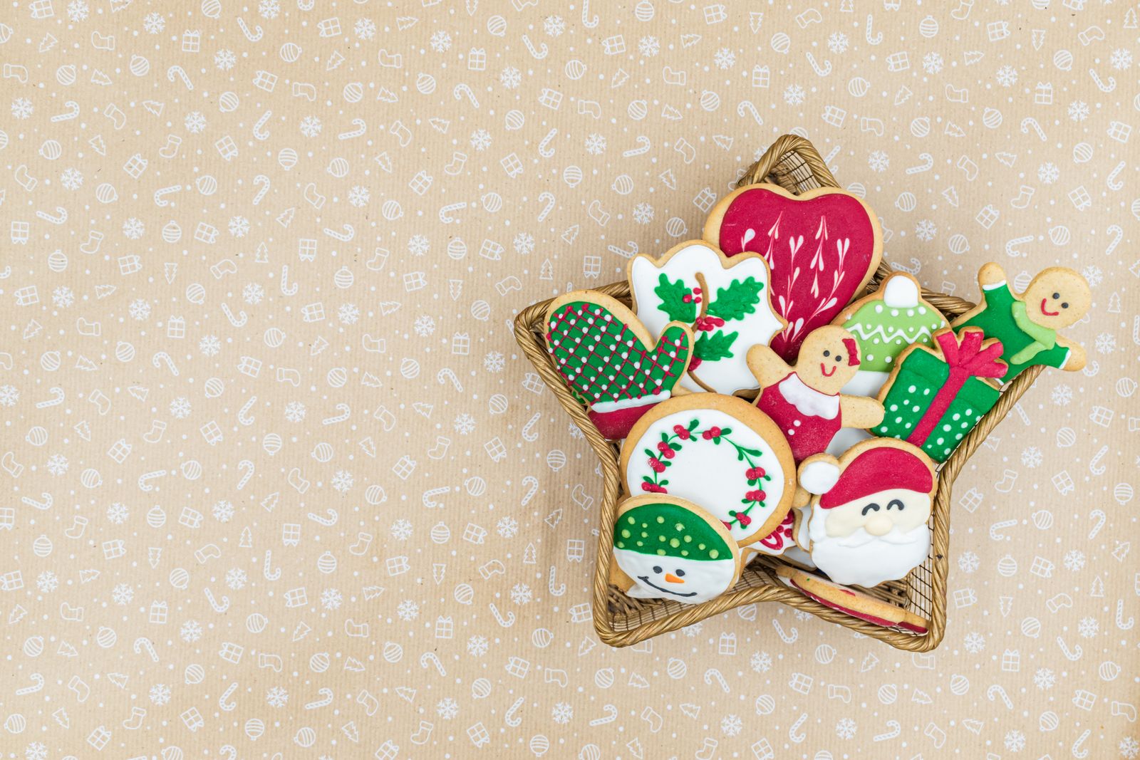 Colorful frosted Christmas cookies on a star shaped plate