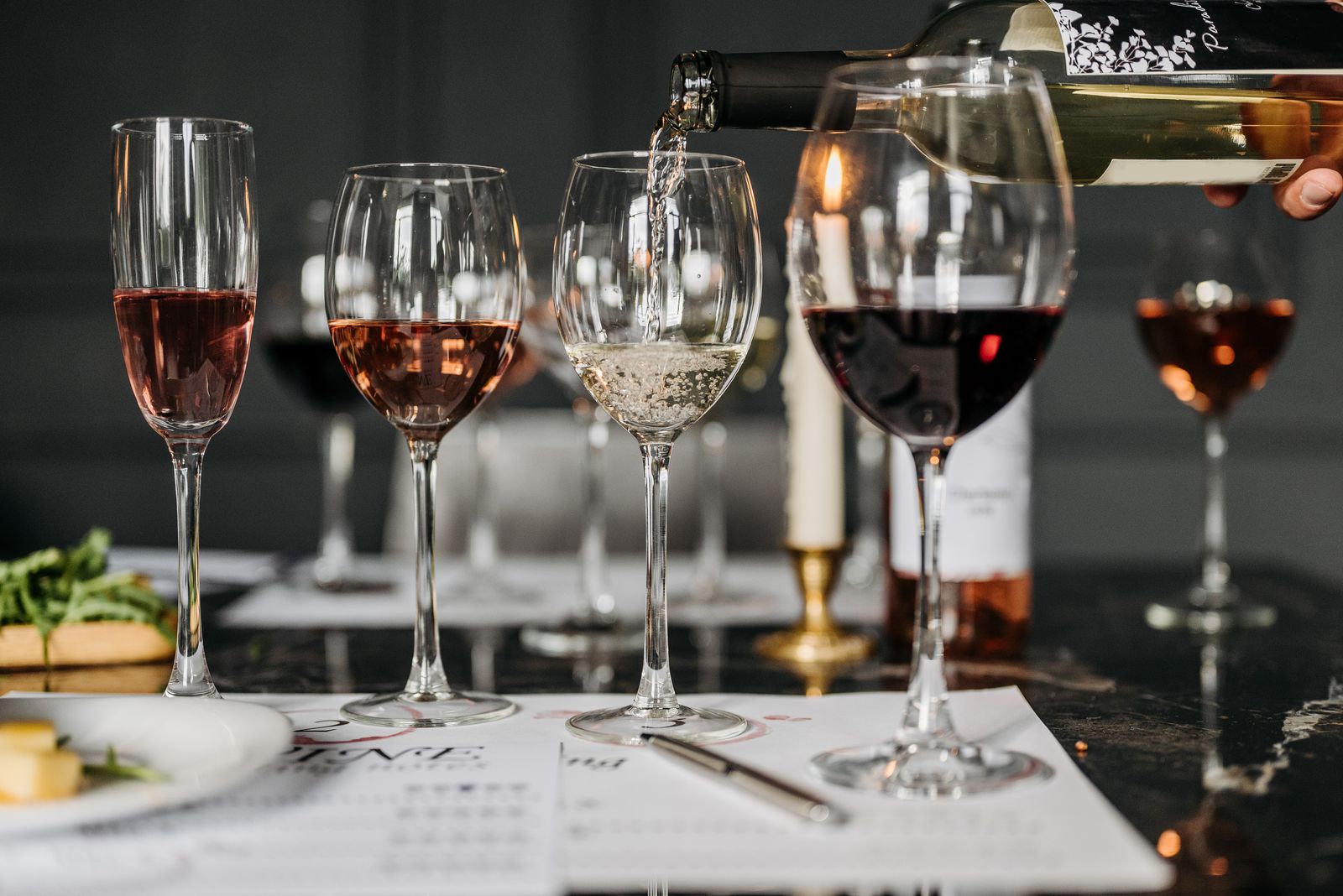 Wine tasting setup with wines poured into glasses